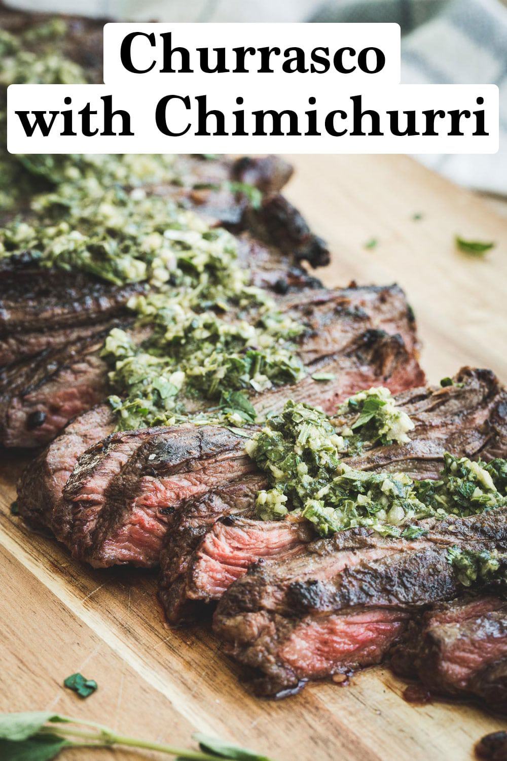 Churrasco with chimichurri sauce spread on top.