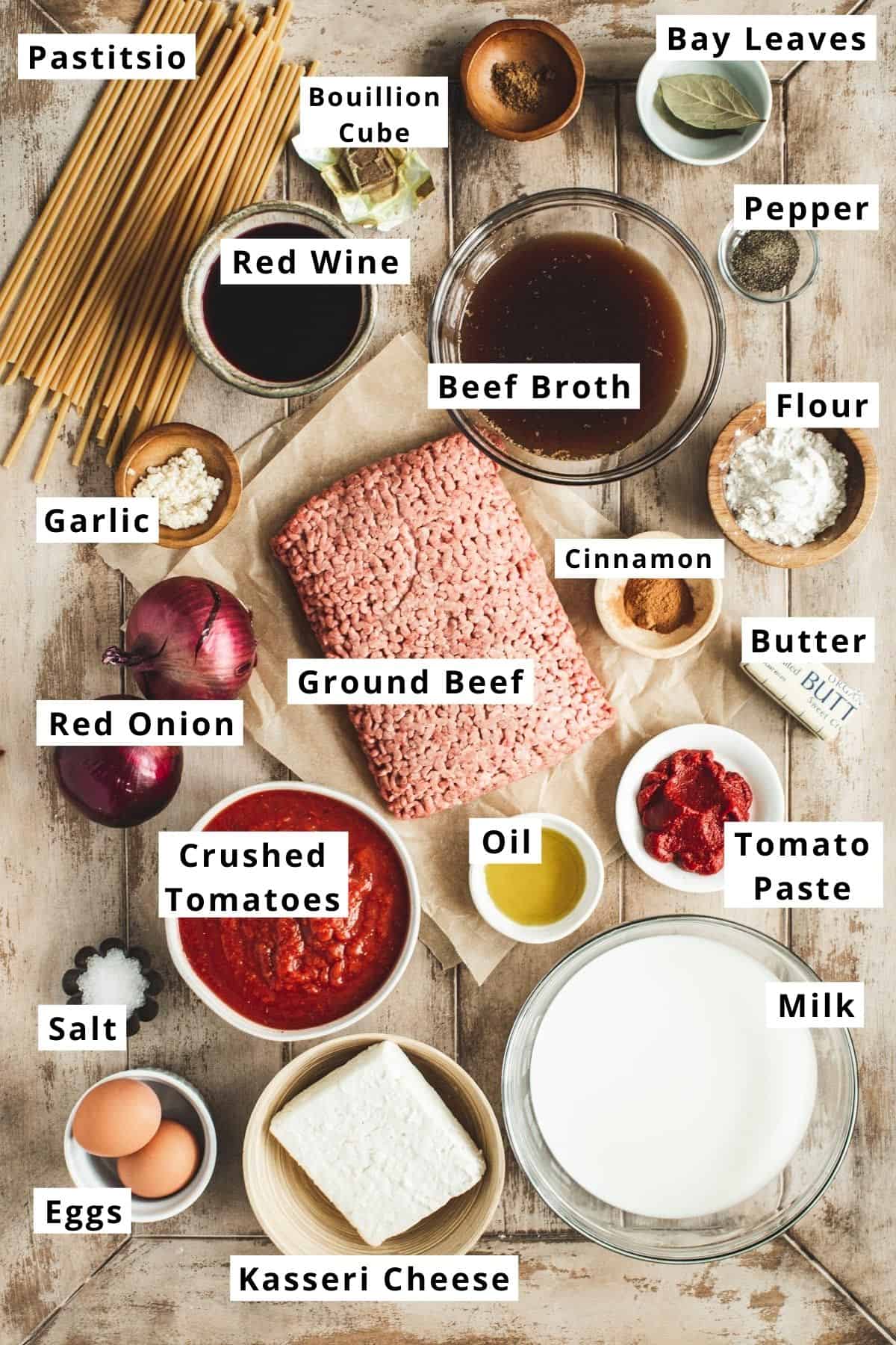 Pastitsio ingredients in various bowls.