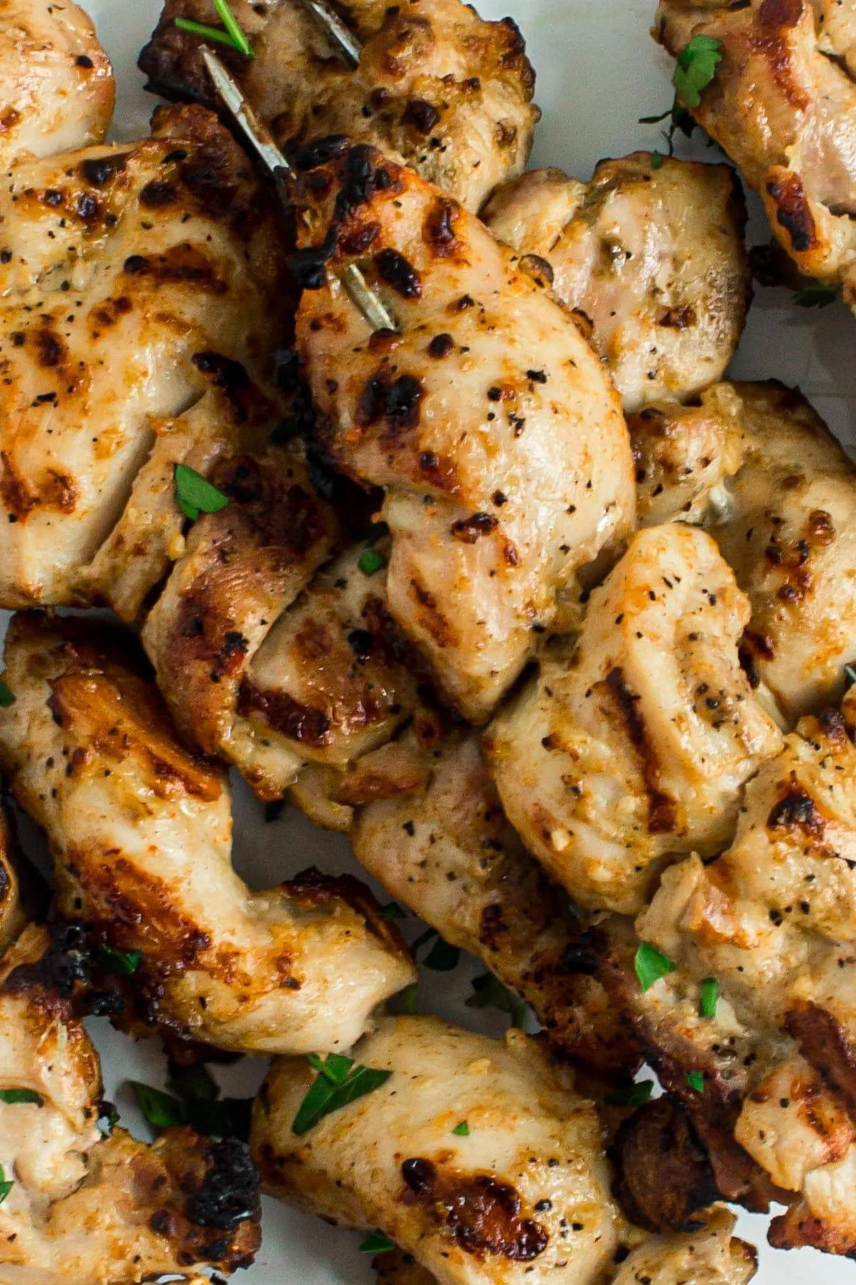 Chicken marinade using yogurt on grilled chicken skewers.