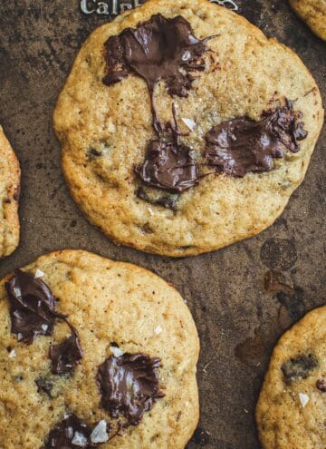 Chocolate chip banana cookies on a baking sheet.