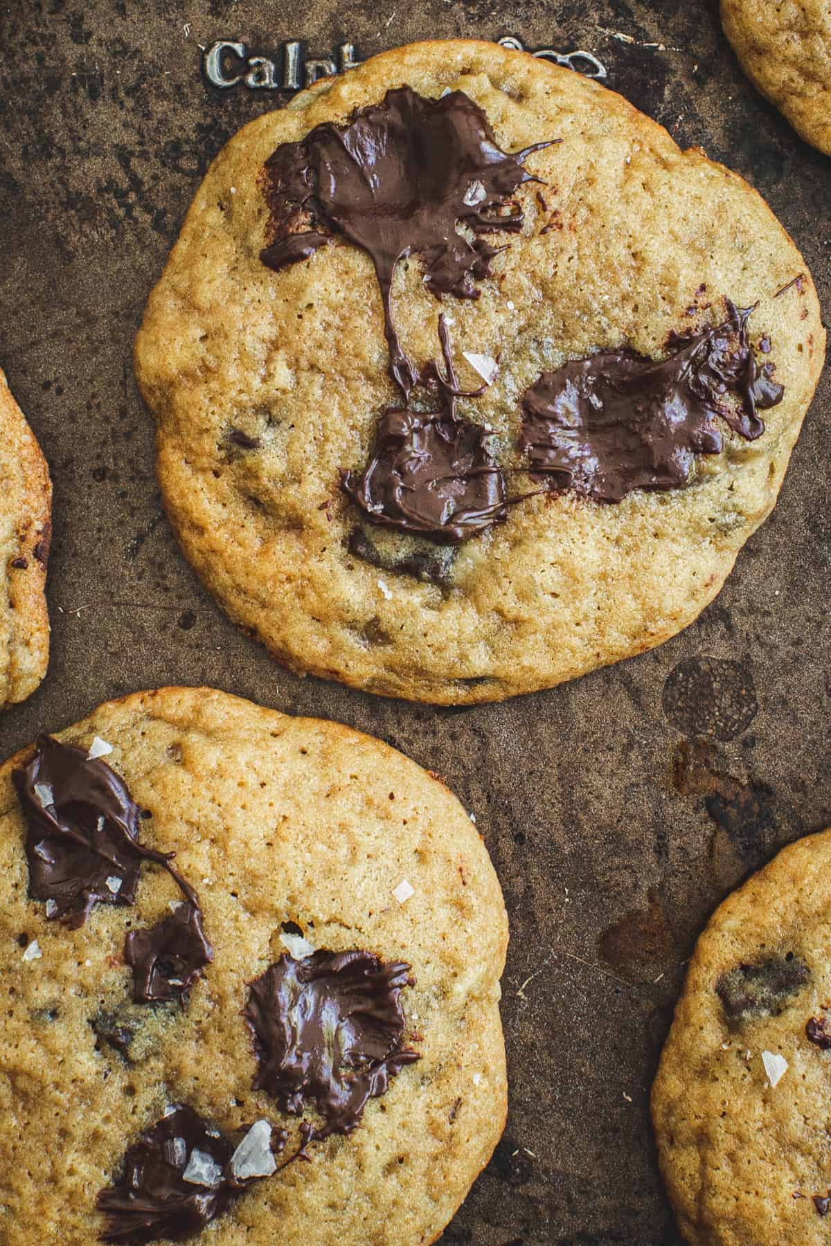 Chocolate chip banana cookies on a baking sheet.