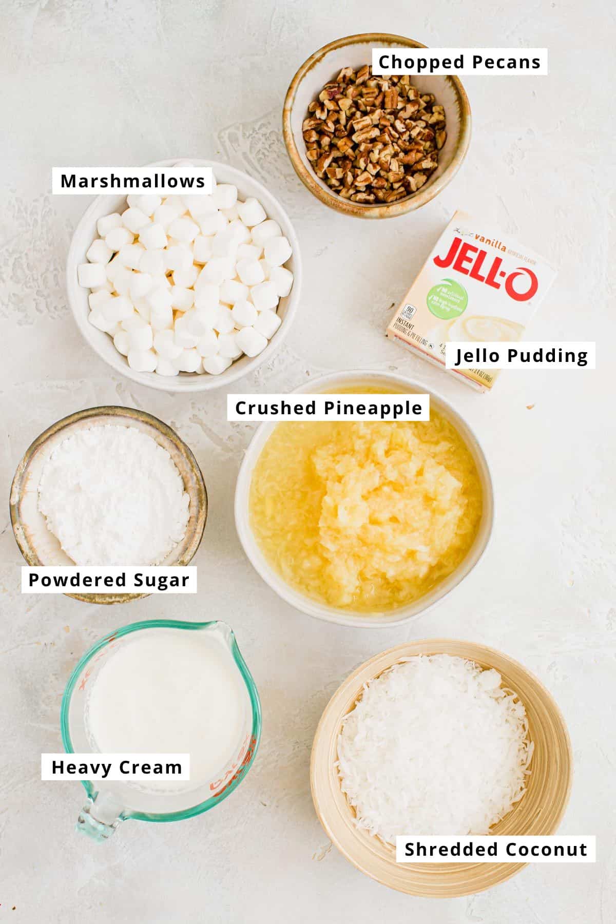 Pineapple fluff ingredients in various bowls.