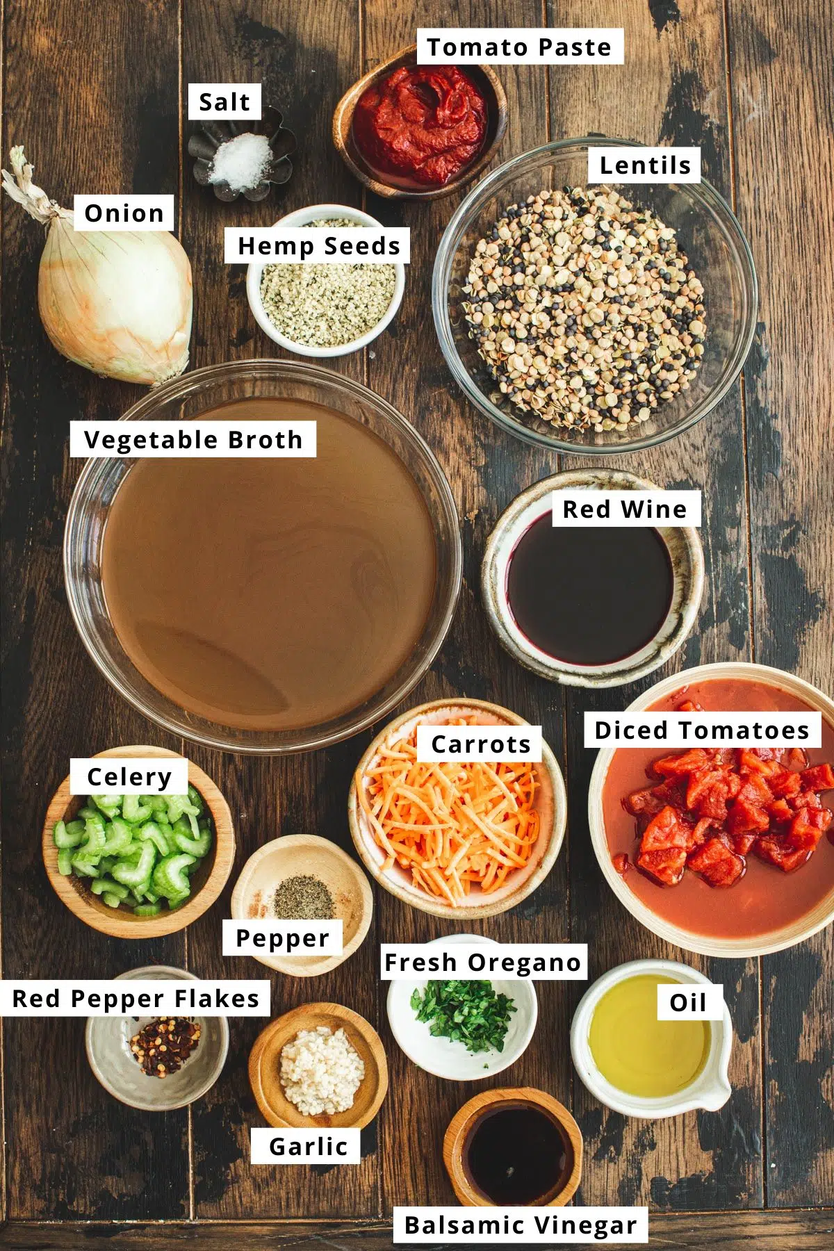 Lentil bolognese ingredients in various bowls.