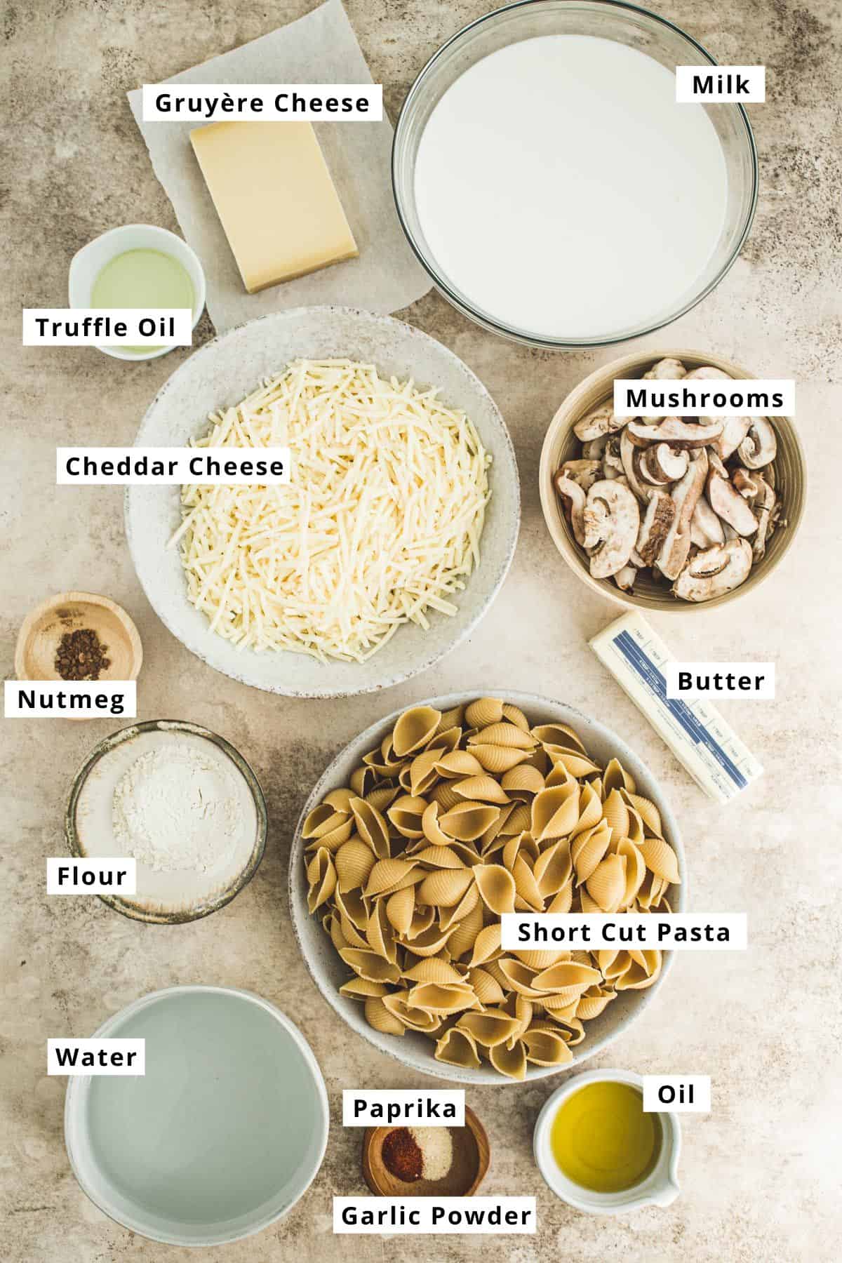 Truffle mac and cheese ingredients in various bowls.