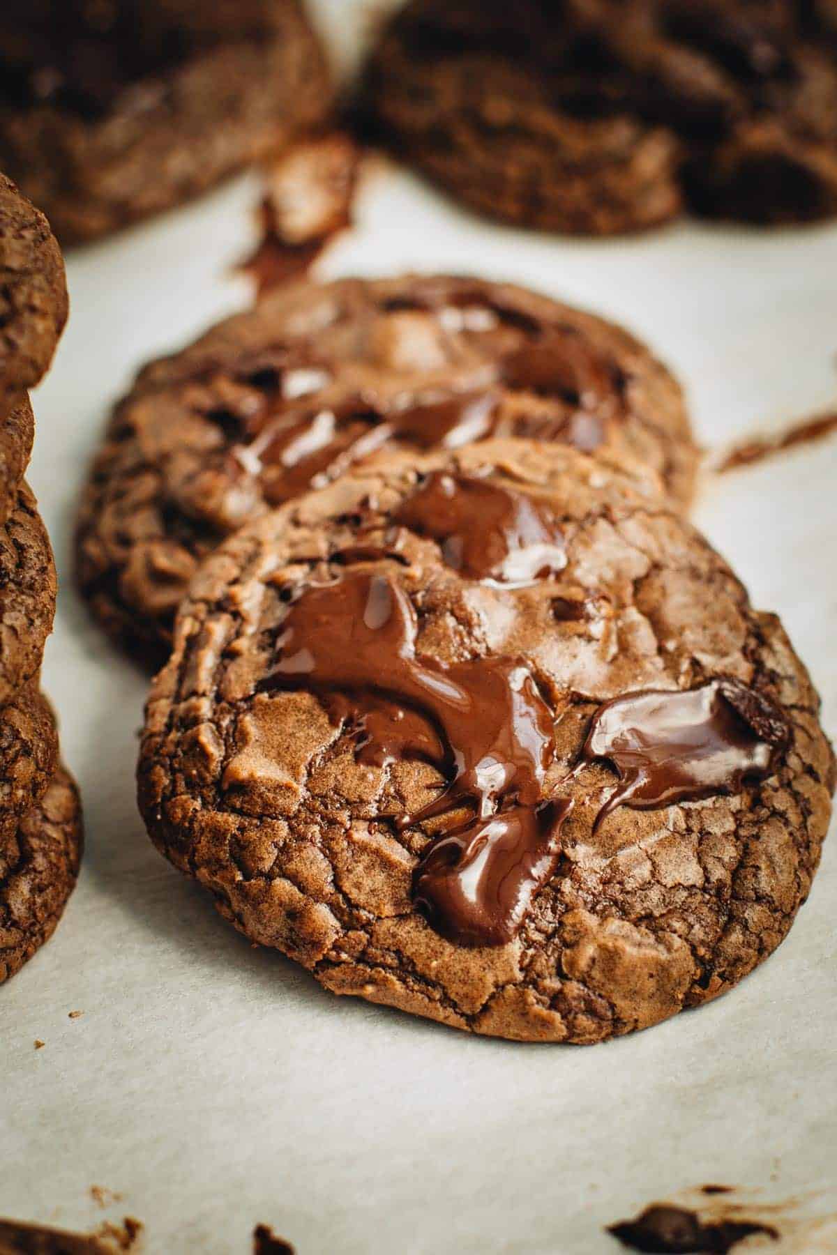 Brownie Mix Cookies laying on top of each other.