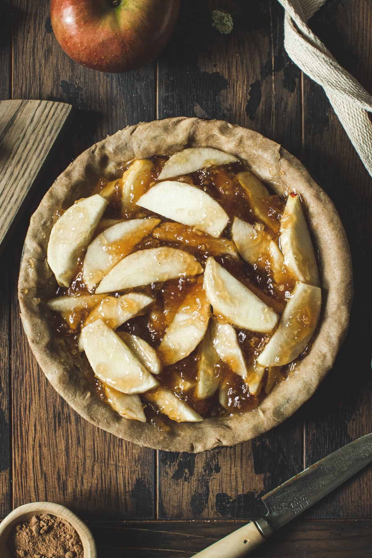 Apple pie filling in a pie crust.