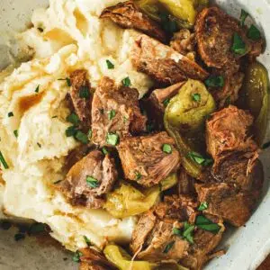 Instant Pot Mississippi pot roast over mashed potatoes.