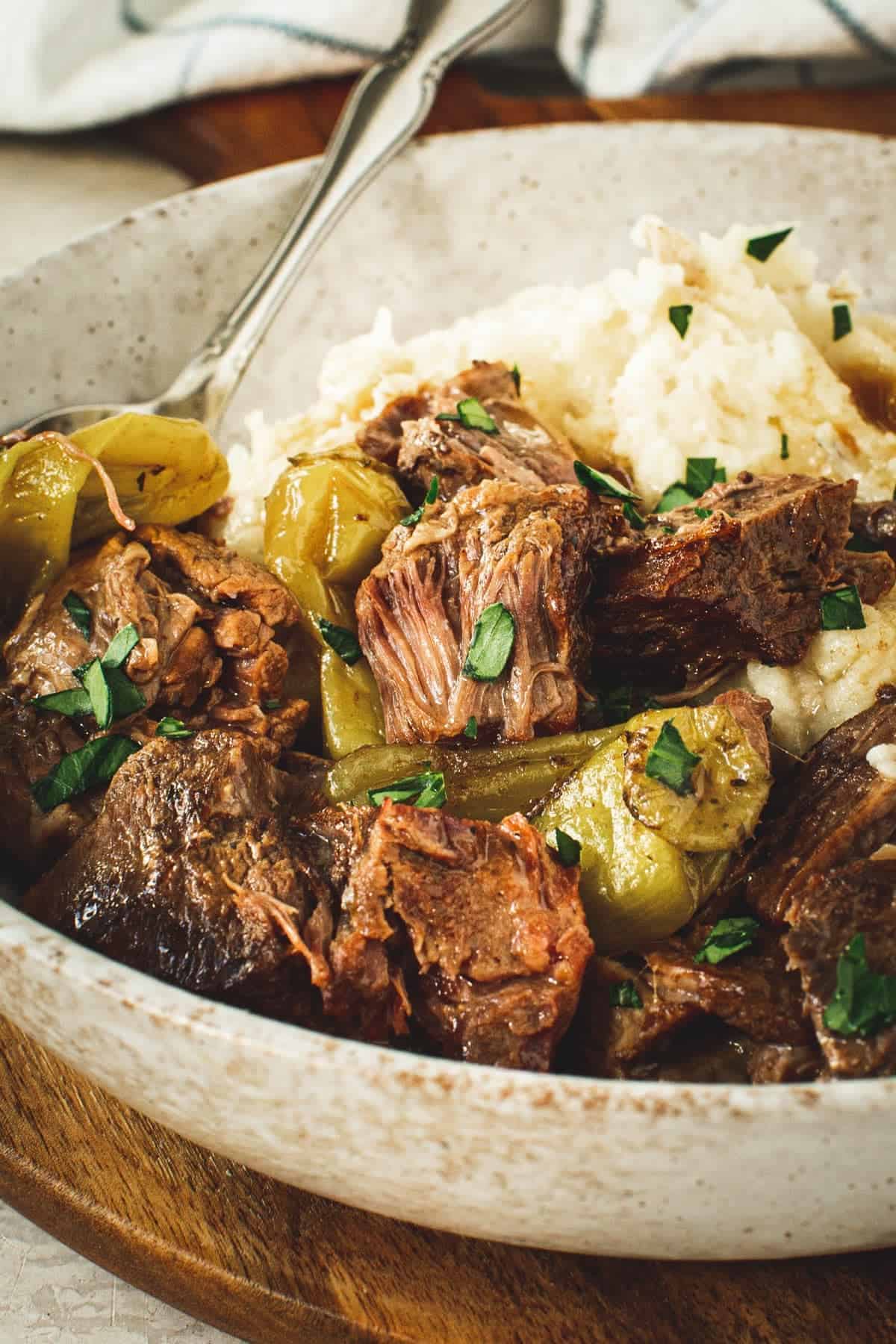 Instant Pot Mississippi pot roast with fresh parsley on top.