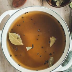 Best brine for pork chops in a white pot.