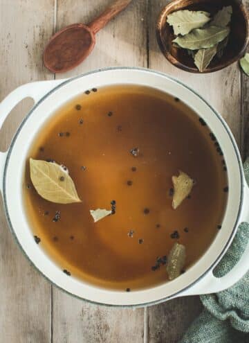 Best brine for pork chops in a white pot.