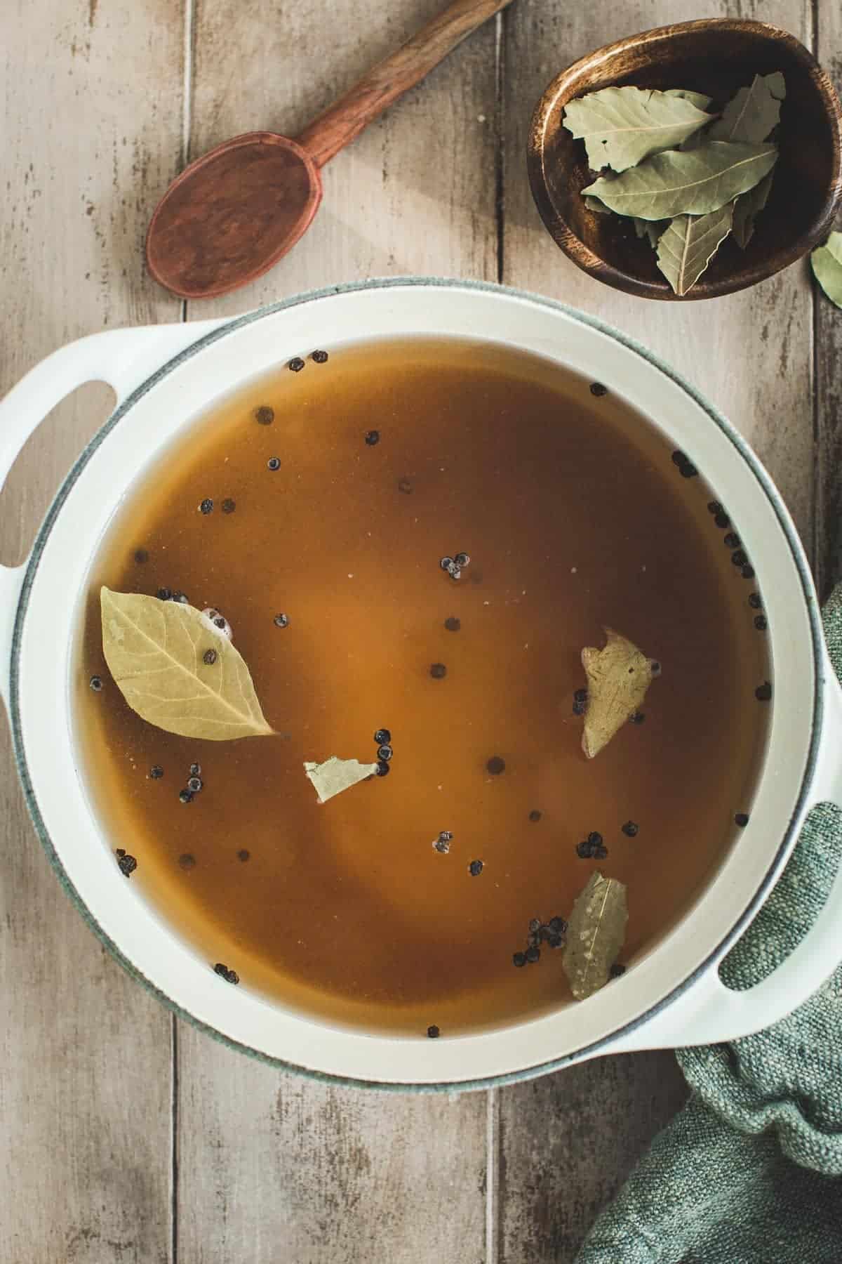 Best brine for pork chops in a white pot.