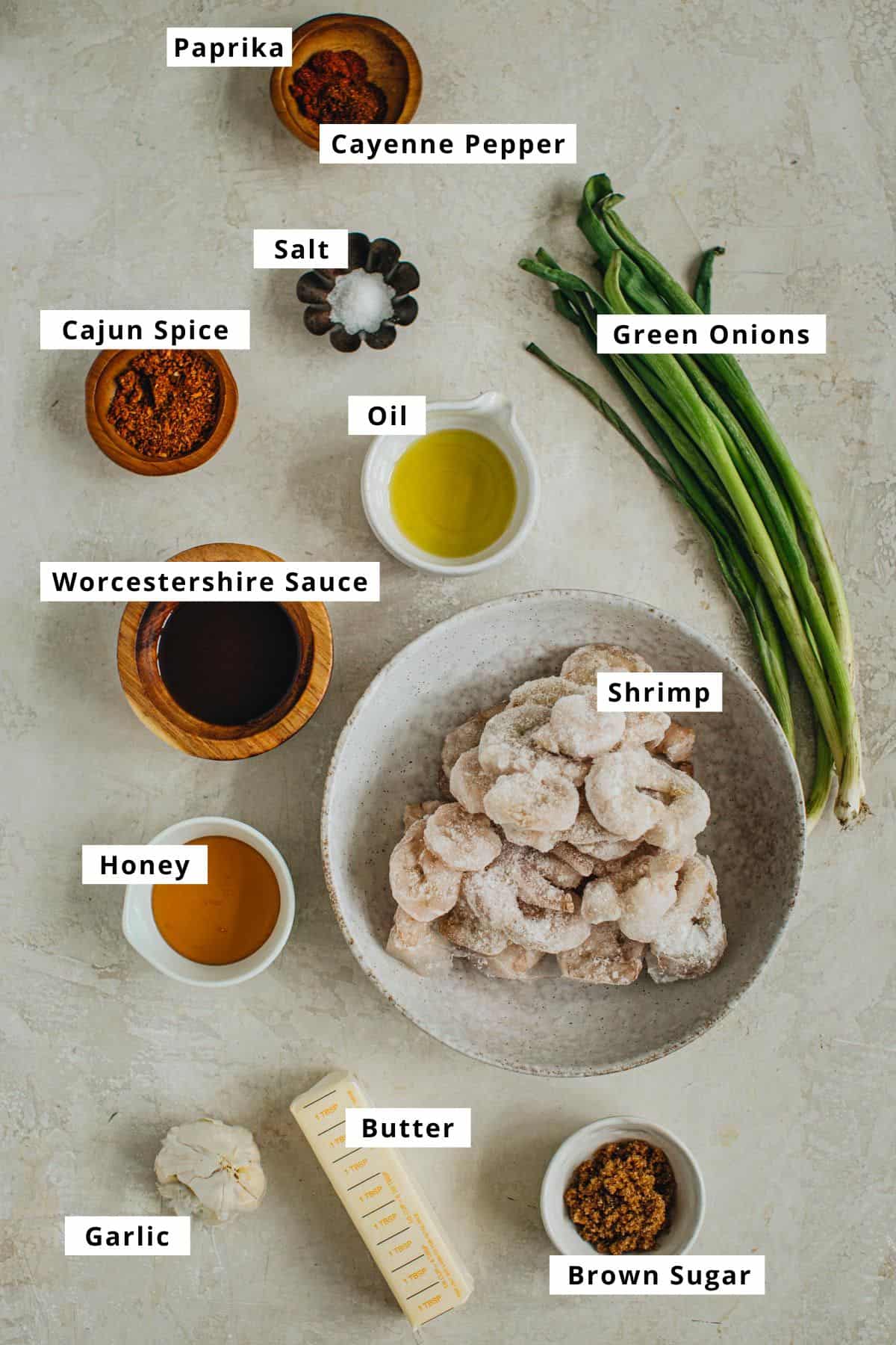 Cajun shrimp ingredients in various bowls.