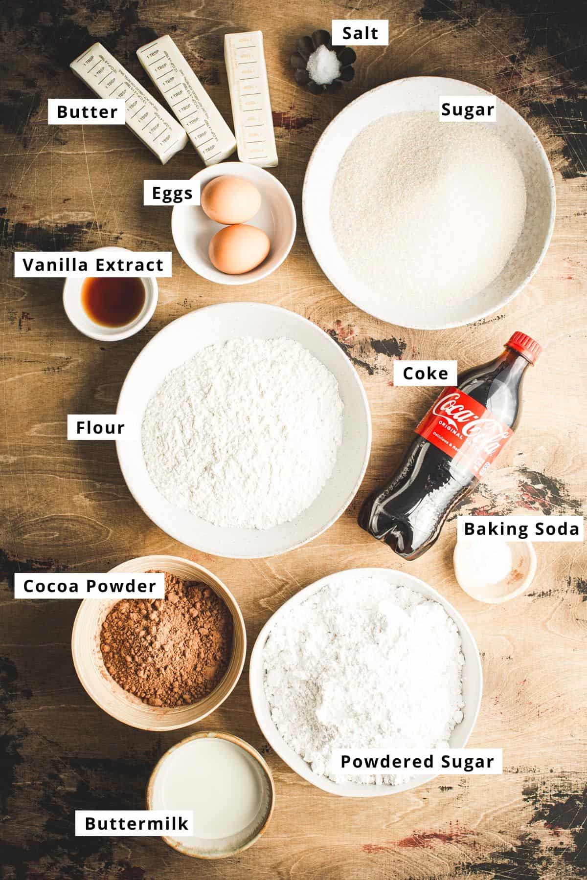 Coca Cola cake ingredients in various bowls.