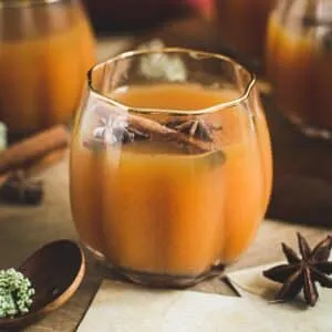 Harry Potter pumpkin juice in a pumpkin glass.