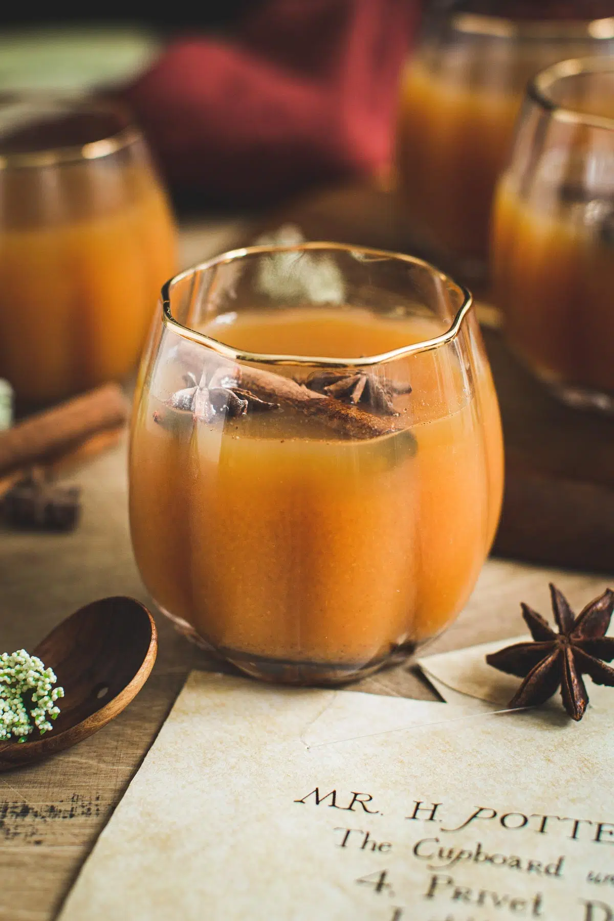 Harry Potter pumpkin juice in a pumpkin glass.