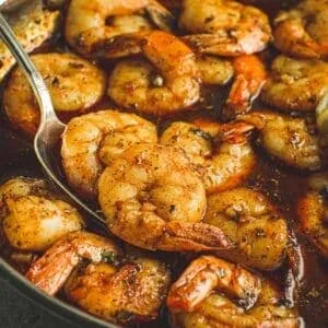 Honey garlic shrimp in a skillet.