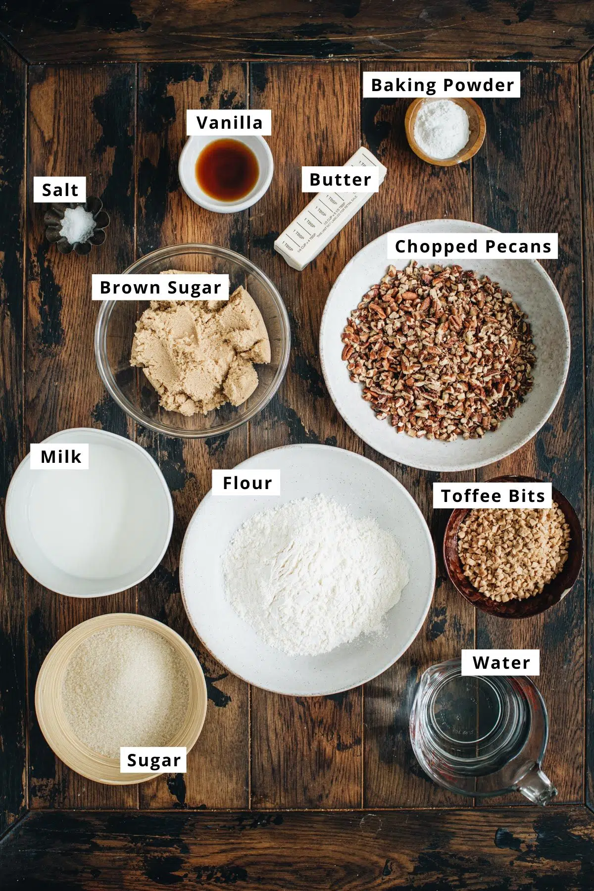 Easy pecan pie cobbler ingredients in various bowls.