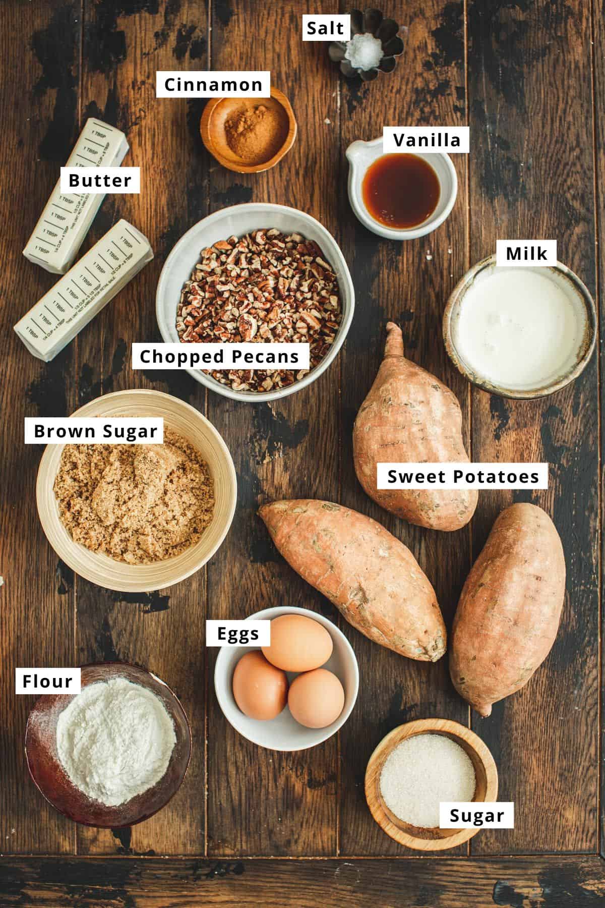 Sweet potato soufflé ingredients on a wooden table.