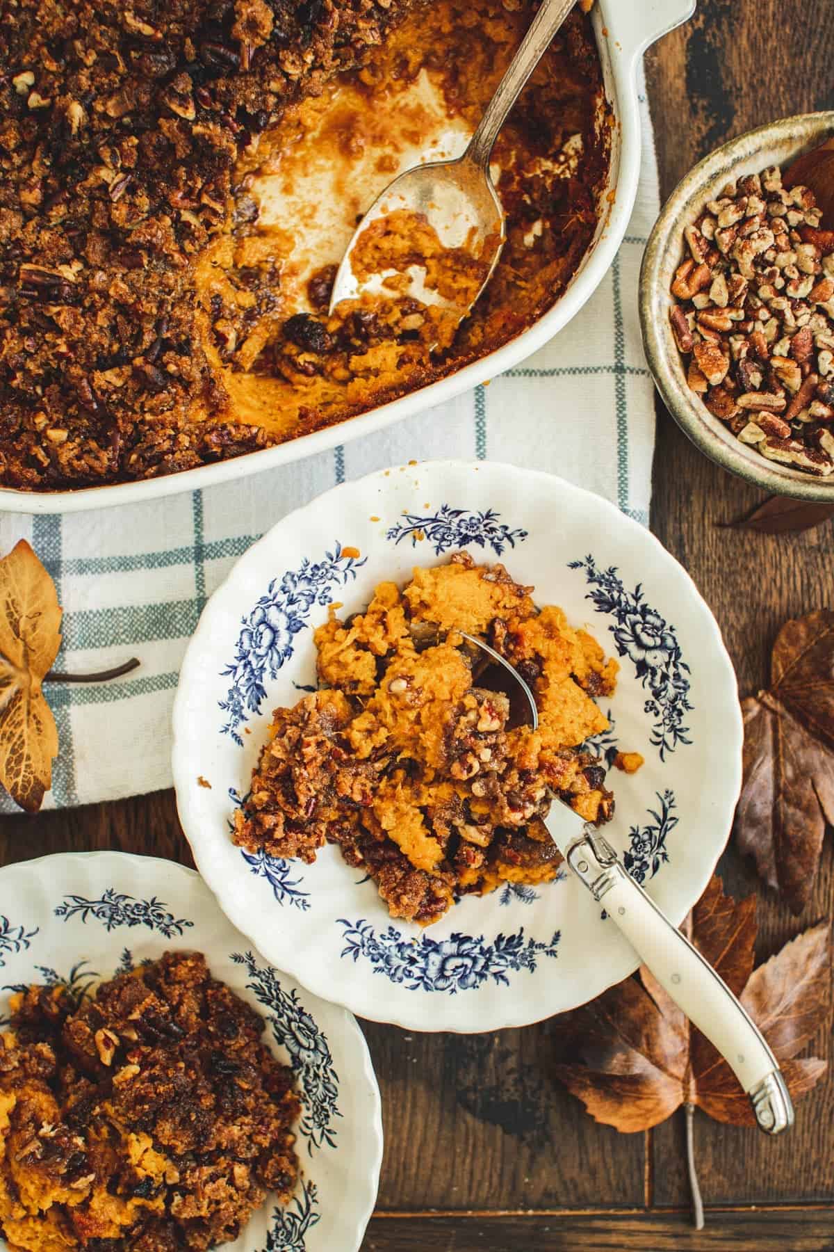 Sweet potato soufflé in blue and white dishes.