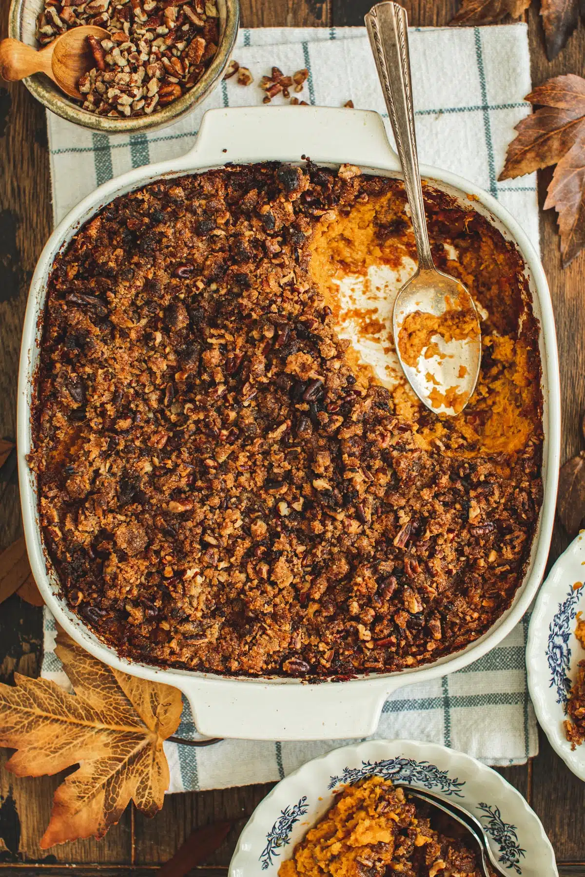 Sweet potato soufflé in a square casserole dish.