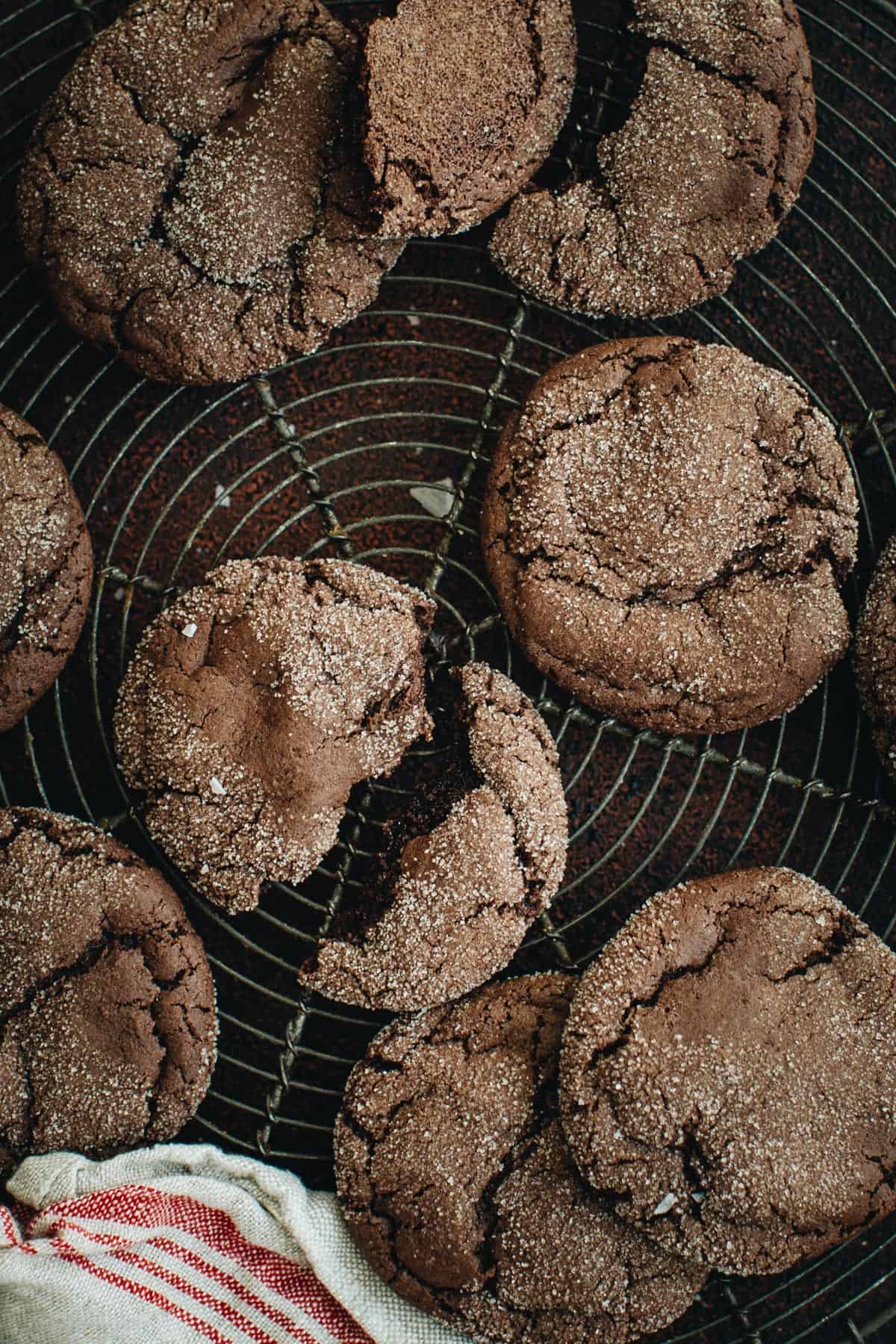 Devil's food cake cookies on a wire rack.