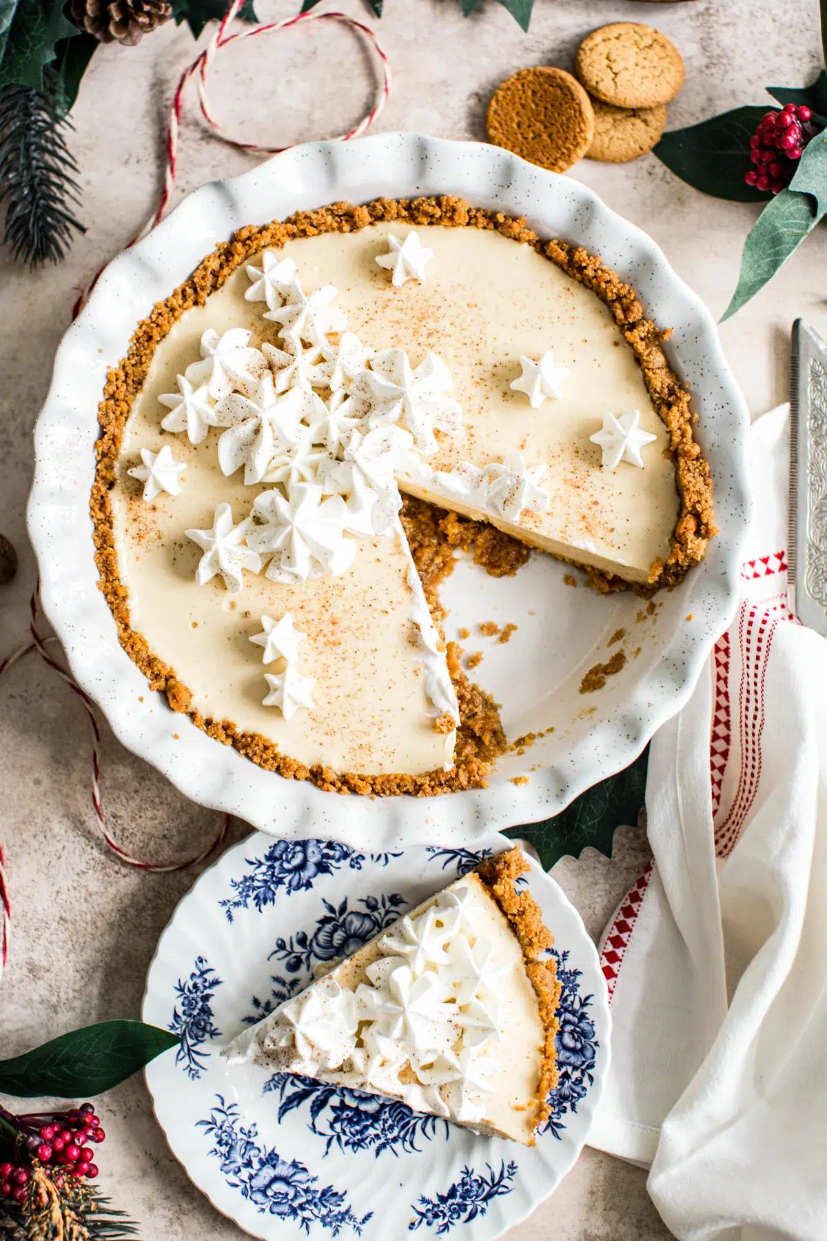 Eggnog pie topped with whipped cream and freshly grated nutmeg.