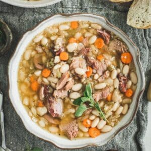Ham and white bean soup in a bowl.