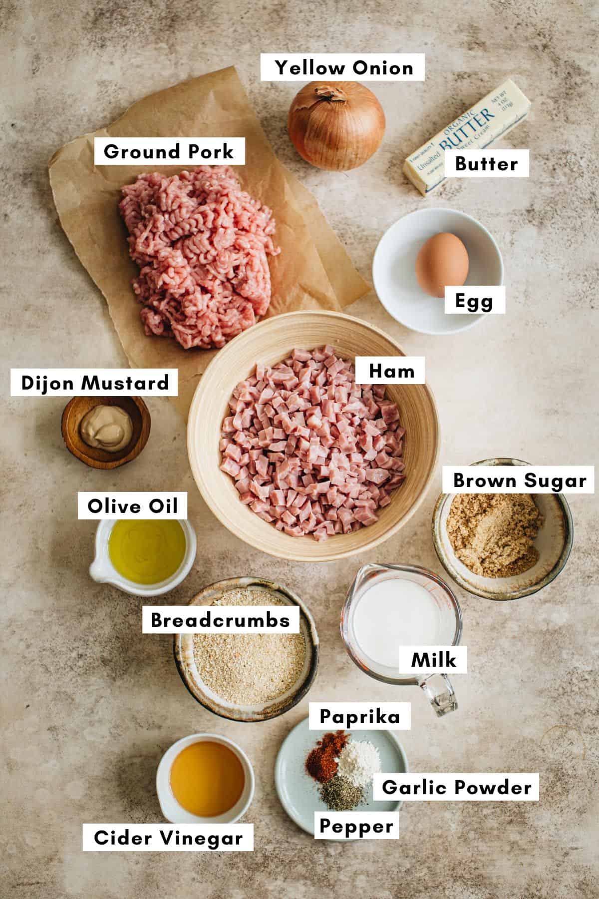 Ham loaf recipe ingredients in various bowls.