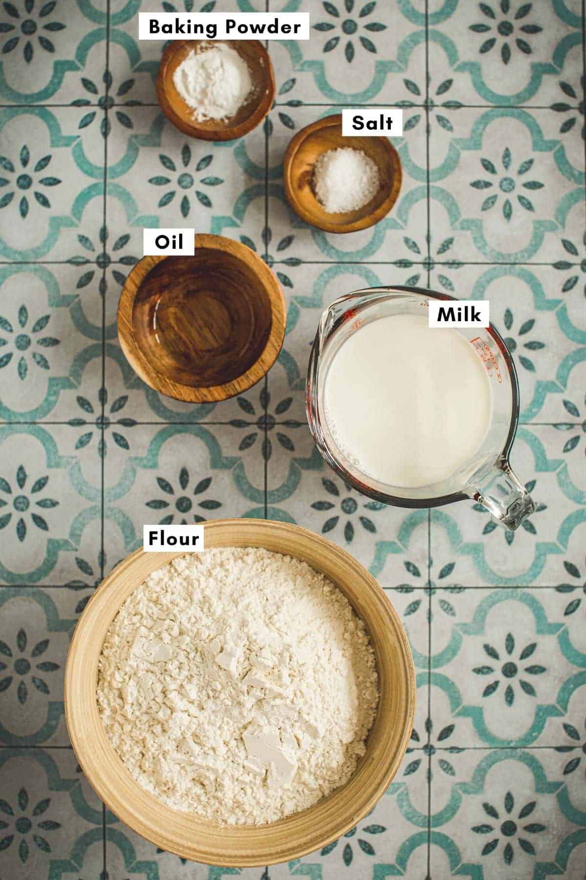 Indian fry bread recipe ingredients in various bowls.