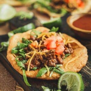 Indian tacos with traditional ground beef and toppings.