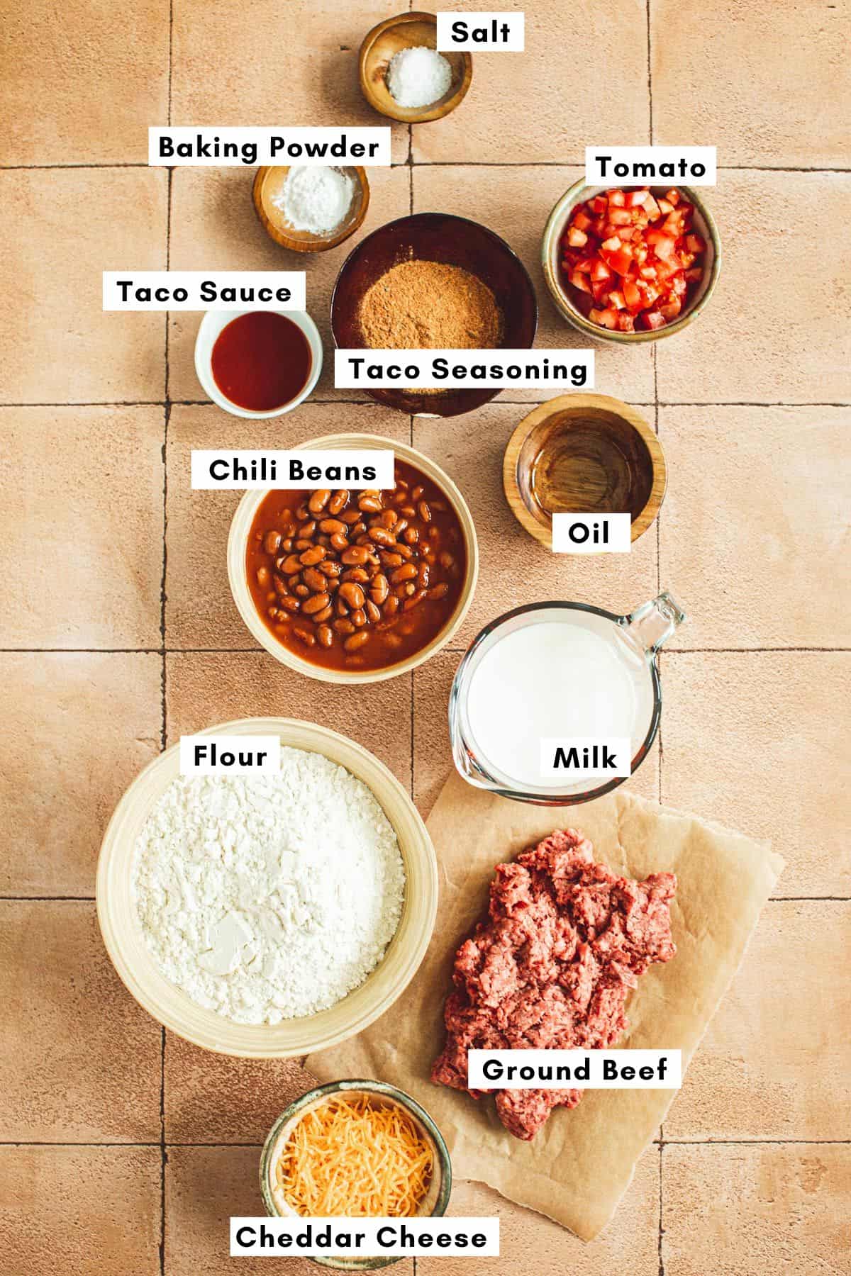 Indian tacos recipe ingredients in various bowls.