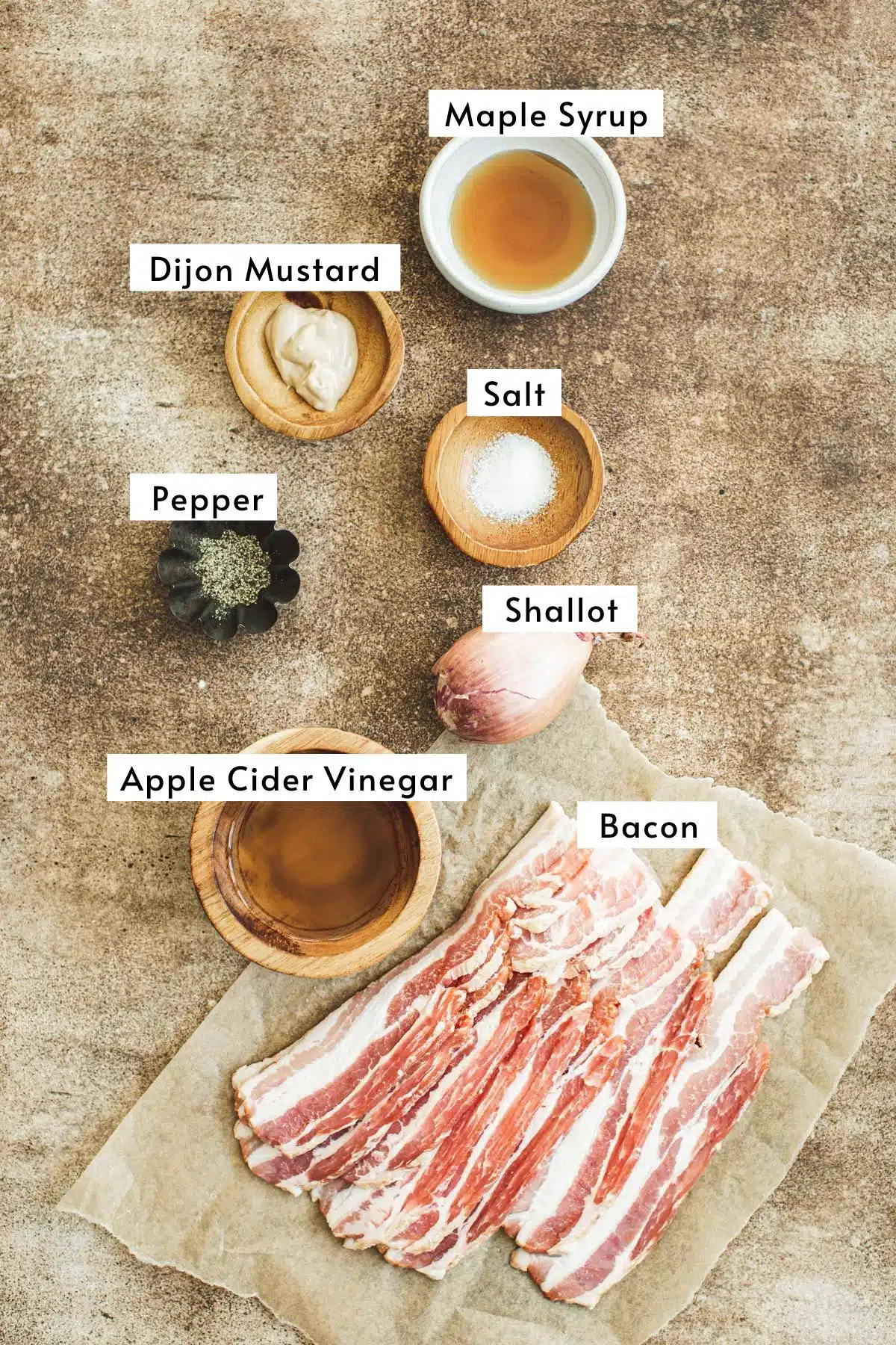 Hot bacon dressing recipe ingredients in various bowls.