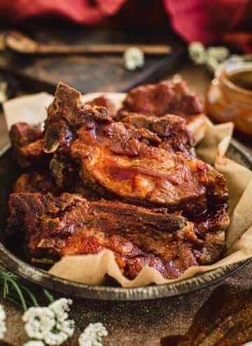 Instant Pot country style ribs in a metal plate.