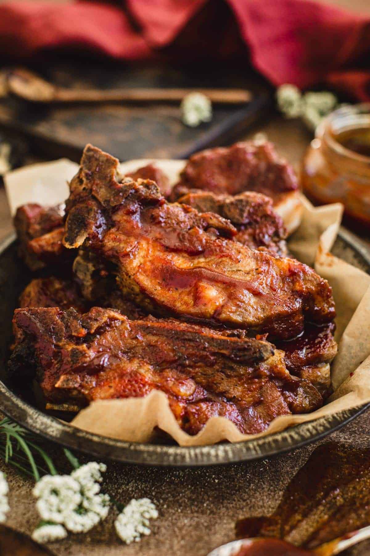 Instant pot country style ribs in a metal plate.