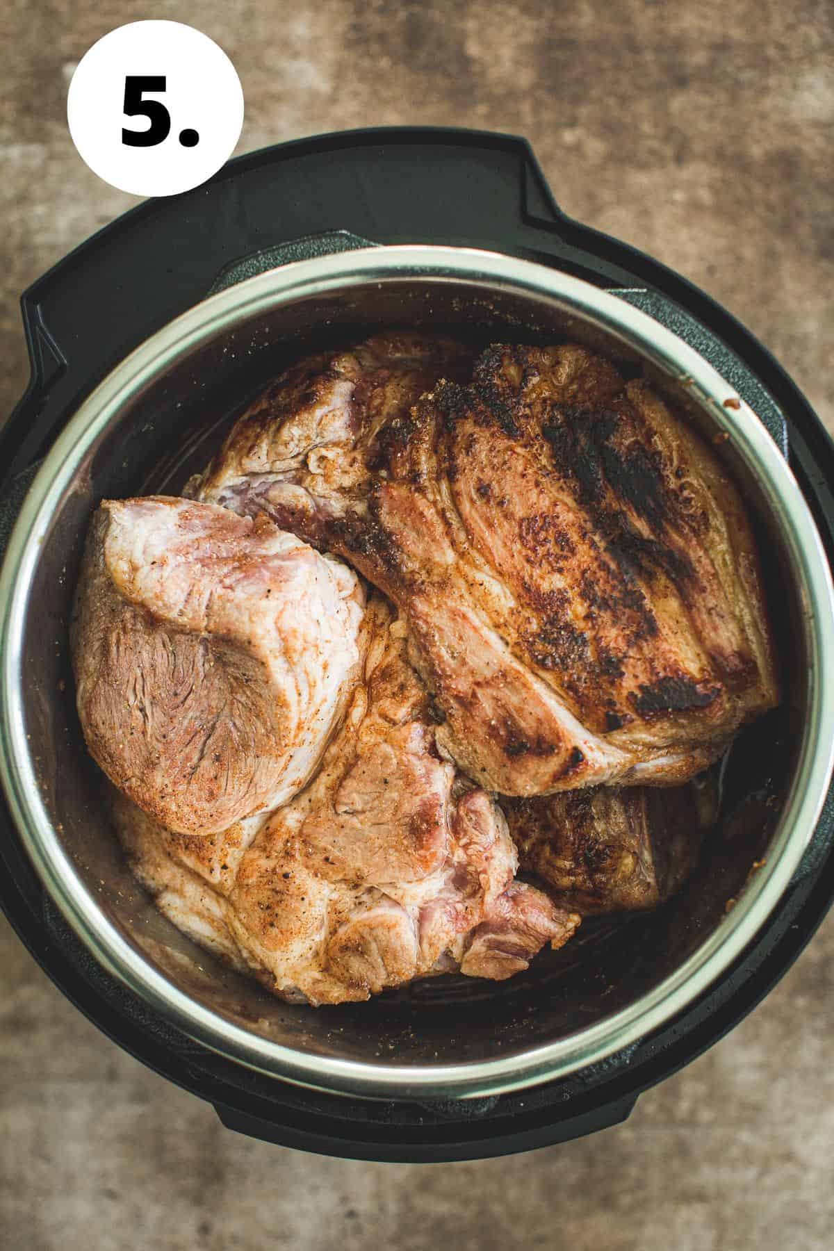 Seared pork butt in the Instant Pot.