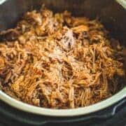 Pulled pork covered in bbq sauce in the Instant Pot.