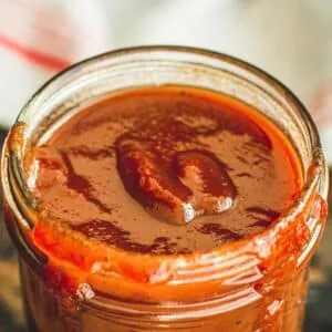 Vinegar based bbq sauce in a jar.