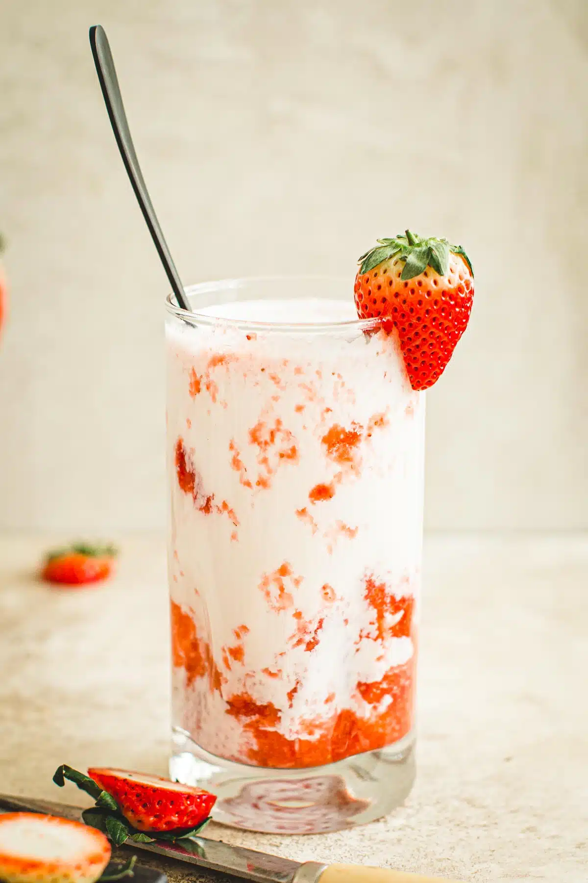 Homemade strawberry milk in a glass.