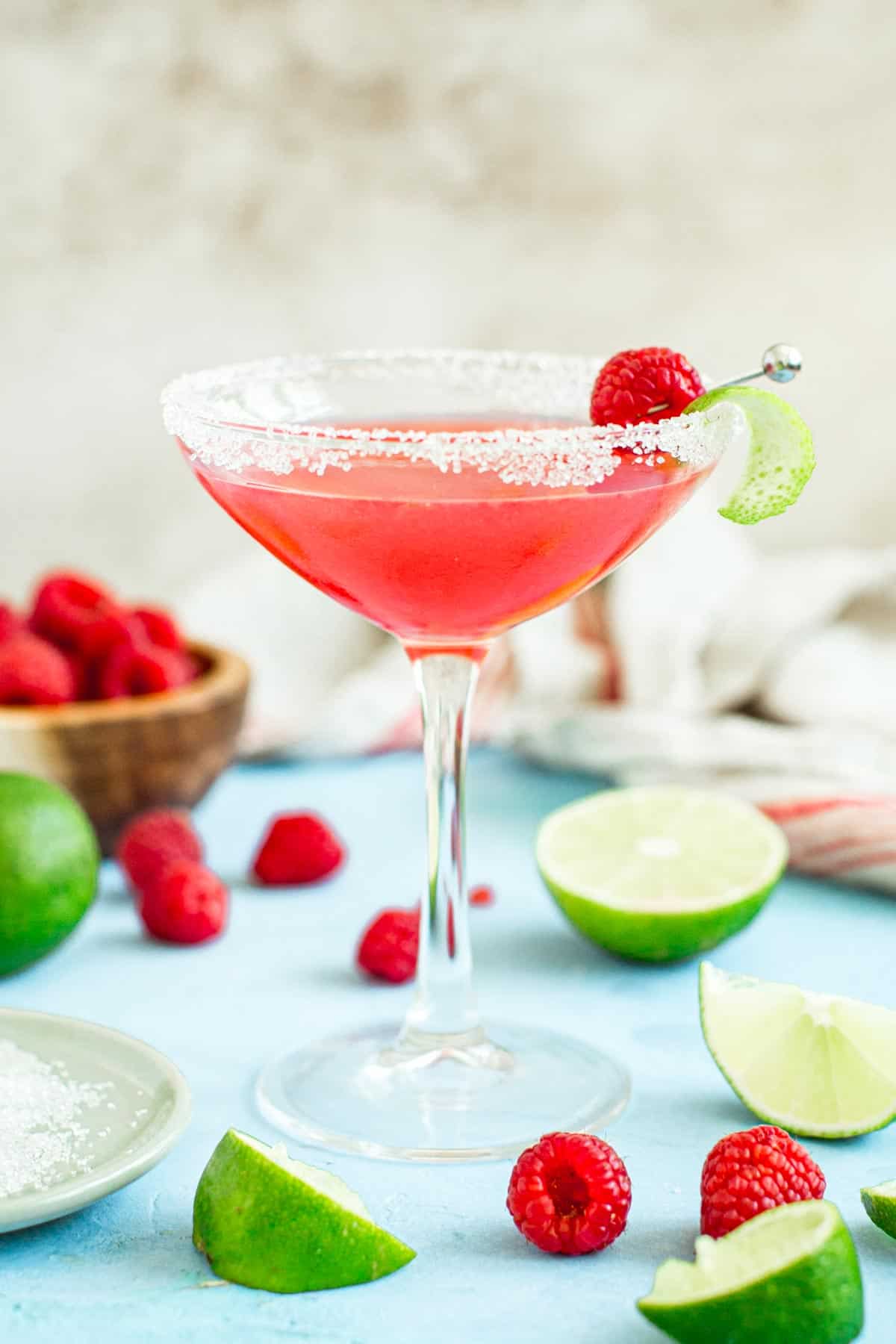 Raspberry daiquiri in a martini glass.
