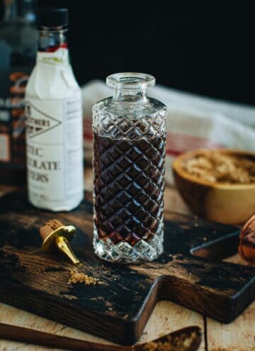 Demerara syrup in a faceted glass bottle.