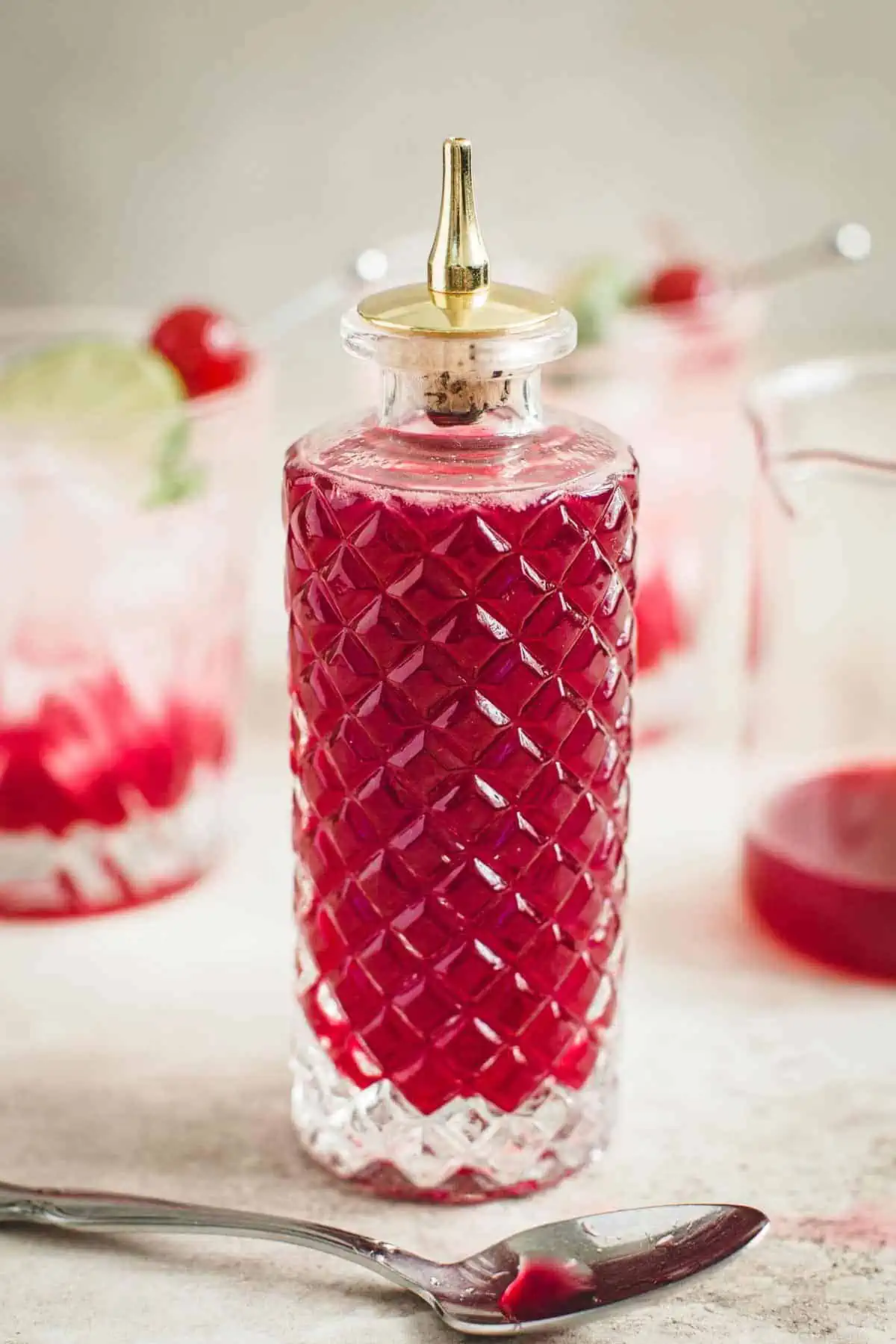 Grenadine syrup in a glass bottle.