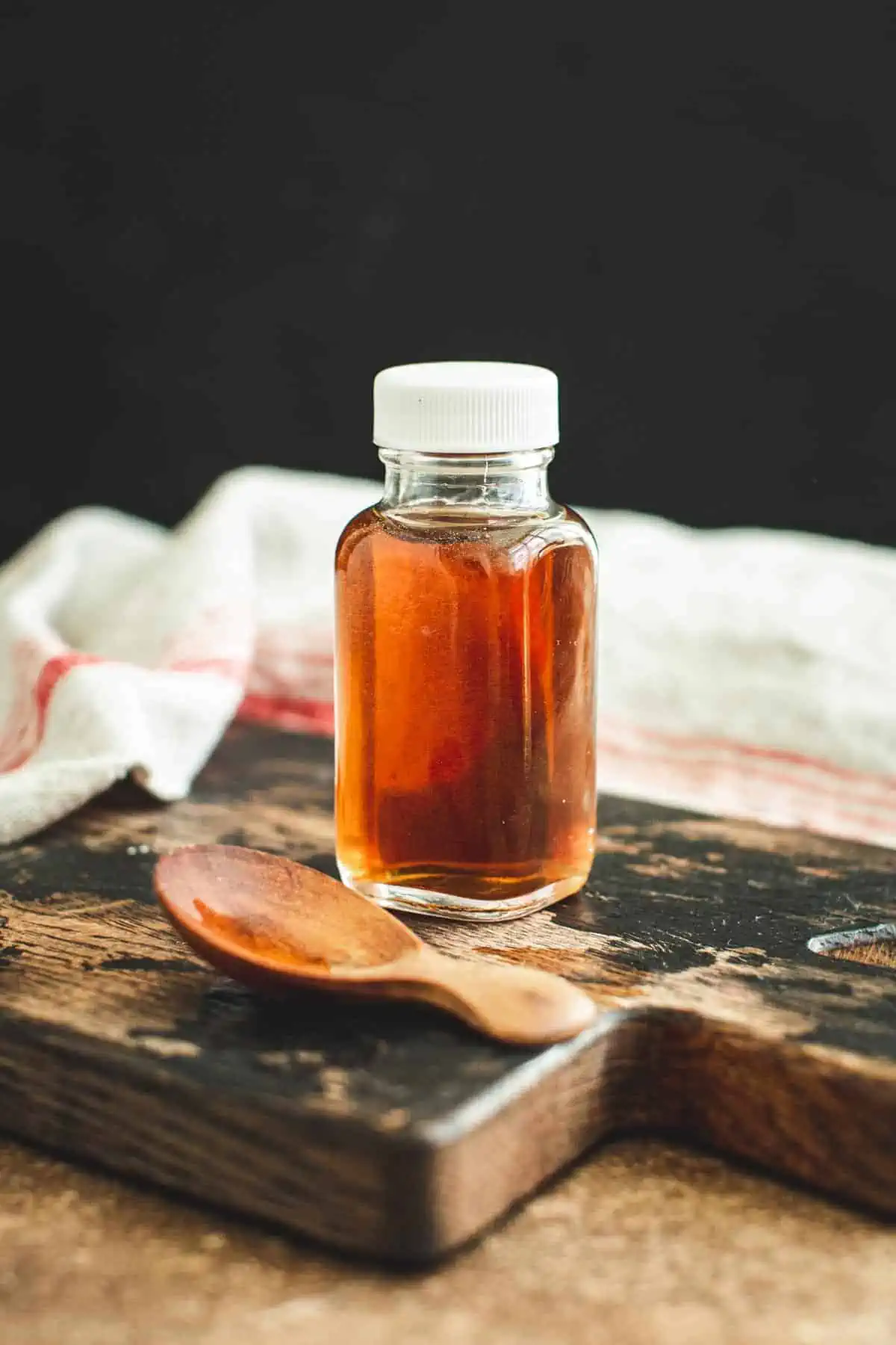 Homemade maple extract in a bottle.