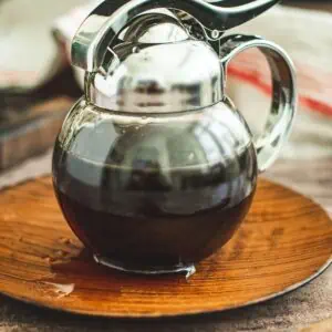 Maple syrup in a dispenser.