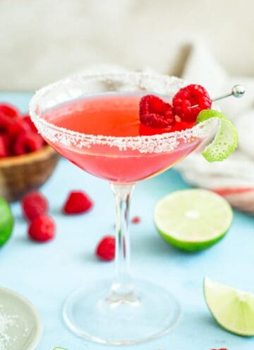 Cocktail glass filled with a raspberry daiquiri.
