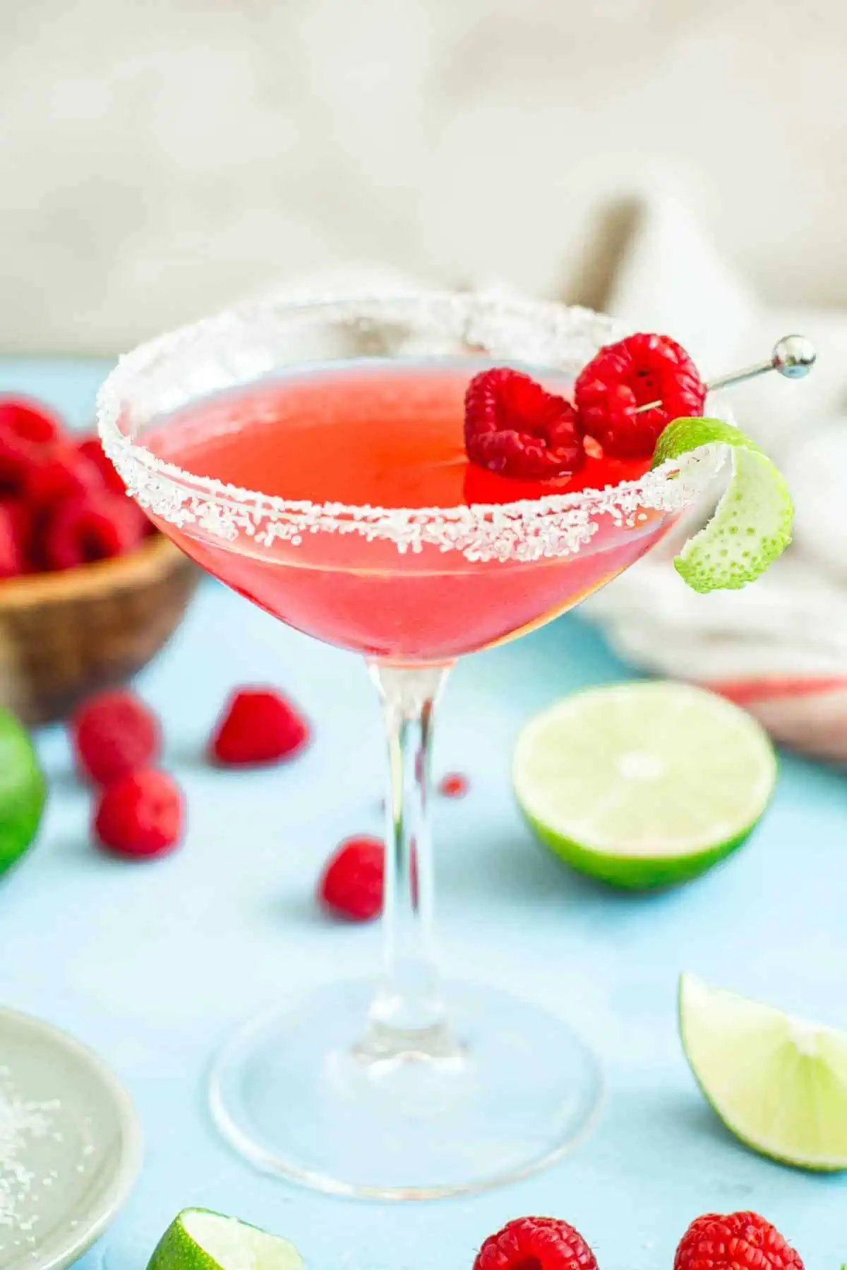 Cocktail glass filled with a raspberry daiquiri.