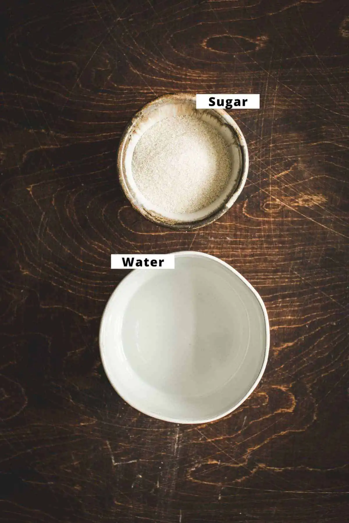 Simple syrup ingredients in separate bowls.