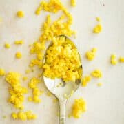 Lemon zest on a spoon and spread around it.
