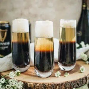 Black velvet drink in stemless champagne flutes.