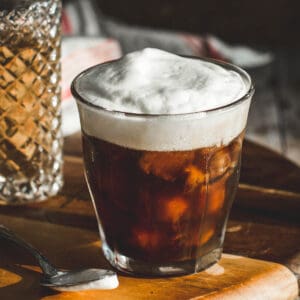 Cold foam over iced coffee.