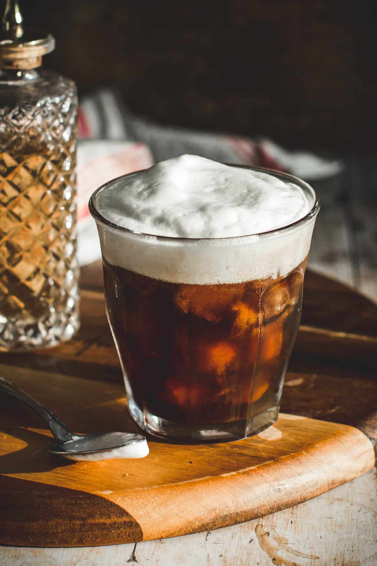 Cold foam over iced coffee.